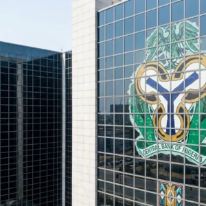Central Bank of Nigerias logo is seen on the headquarters building in Abuja